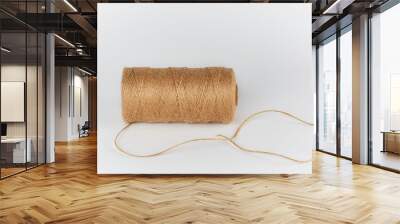 spool-wrapped brown rope of jute Wall mural