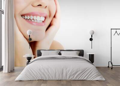 Closeup shot of happily laughing pretty woman against a grey background with copyspace Wall mural