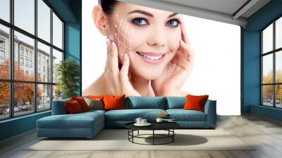 Young female with clean fresh skin, white background Wall mural