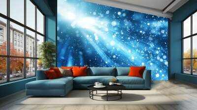 A blue sky with a bright light shining through the clouds Wall mural