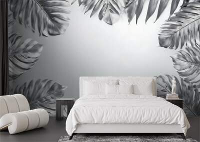 Silver tropical leaves on blank background. Creative layout, top view, blank space, Minimal summer concept. Wall mural