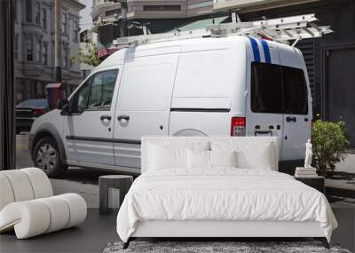 Parked utility truck in urban setting. Side and rear view. Horizontal. Wall mural