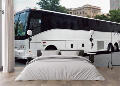 parked white tour charter bus with dark tinted windows. Wall mural