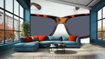 Tortoise shell sunglasses on white background. Wall mural