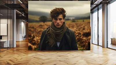 editorial portrait of a white male model standing in a field in autumn / fall Wall mural