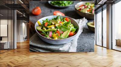 Healthy arugula salad with avocado, radish, bell pepper, tomato and Roquefort cheese Wall mural