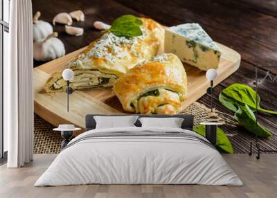 Savory strudel stuffed with spinach, Roquefort, Feta cheese and garlic Wall mural