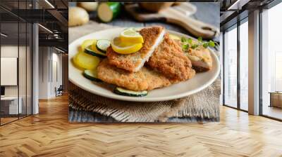 Turkey schnitzel with potato and zucchini Wall mural