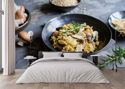 Vegetarian barley risotto with roasted mushrooms, fennel and Parmesan cheese slices Wall mural