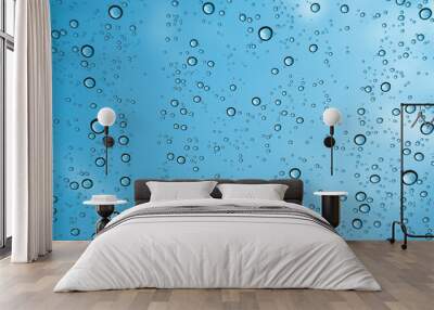 Rain on the window, natural skin of the rain The natural form of rainwater on a sky background. Wall mural