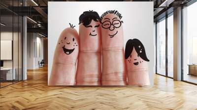 painted smiley on human fingers Wall mural