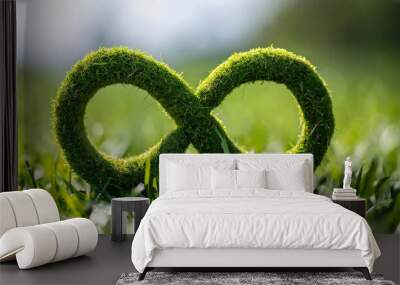 An eco-friendly business continuity concept in manufacturing, featuring a lush green infinity symbol crafted from grass, representing sustainable practices and endless growth in the industry Wall mural