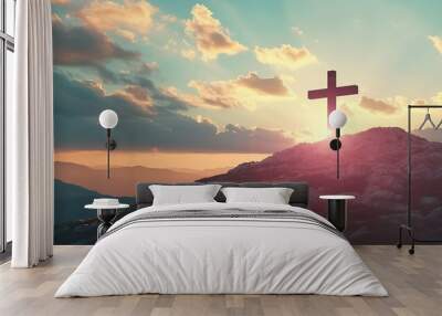 Majestic cross stands atop mountain, illuminated by golden sunrise, conveying hope and spiritual inspiration, Good Friday and Easter Sunday concept Wall mural