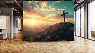 Majestic cross stands atop mountain, illuminated by golden sunrise, conveying hope and spiritual inspiration, Good Friday and Easter Sunday concept Wall mural