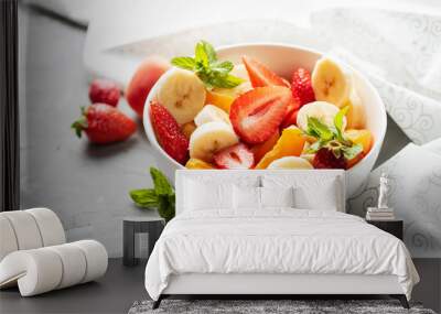 Bowl of healthy fresh fruit salad Wall mural