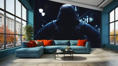 Angry man, sitting with a hood on Wall mural