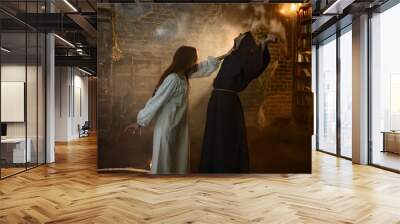 Exorcist casting out satan from young woman Wall mural