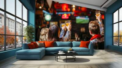 Group of football fans watching match in sport bar Wall mural