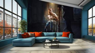 Maniac with baseball bat standing against victim Wall mural