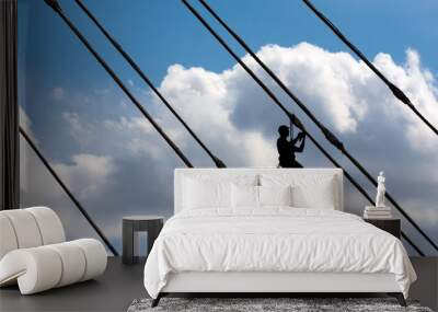 Silhouette of construction climber Wall mural