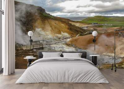 Stunning landscape of steaming ground in Krýsuvík, Seltun in good sunny day with blue sky, Reykjanes Peninsula, Global Geopark, Geothermal active area on southwest of Iceland, Europe Wall mural