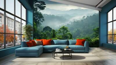 view of tropical forest with fog in the morning during the rainy season. isolated on a green garden background Wall mural