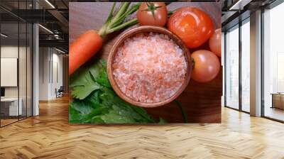 Himalayan pink salt in wooden bowl, Healthy food ingredient. ai generated Wall mural