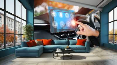 Car business concept and technology on virtual screen, Close up hand a man touch on the monitor screen of car setting car system for lifestyle my self,inside the car with multimedia and technology Wall mural