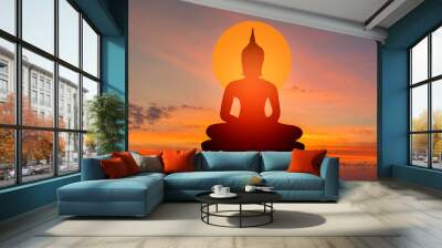 buddha silhouette on golden sunset background beliefs of Buddhism Wall mural