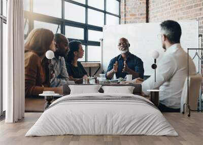 Mature, manager and business meeting in boardroom with discussion for financial growth at table. Company, vision and planning in workshop with mentor, staff and teamwork training in accounting firm. Wall mural