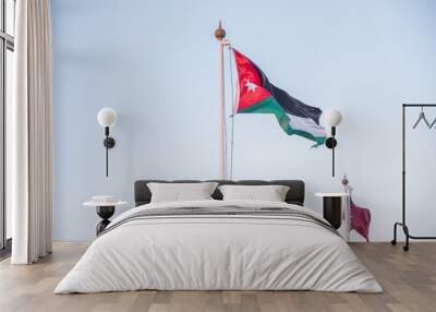 Jordan flag with clear blue sky in the background Wall mural