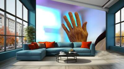 blurred, hand raising for religion background Wall mural