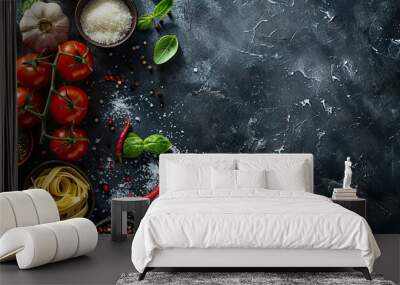 Italian food and ingredients background with, tomatos, garlic, salt, pepper, basil, pasta and spices. Top view, view from above. Copy space. Dark background. Wall mural