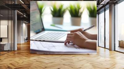 Person filling out online health insurance forms on a computer Wall mural