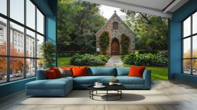 Rustic stone chapel nestled in lush surroundings with a cobblestone pathway leading up to its antiquated wooden door and verdant foliage. Wall mural