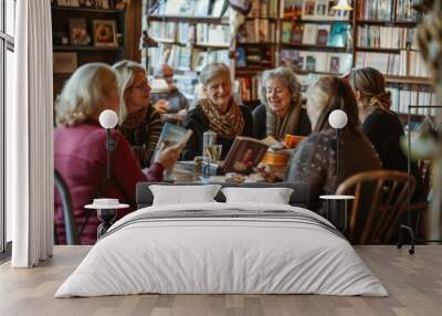 six elderly women are enjoying conversation and books in a cozy cafe setting, exuding warmth and com Wall mural