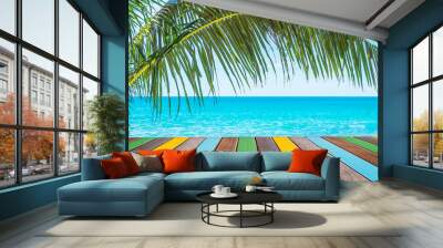 Multicolor wood table top and sea beach background. Wall mural