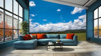 green farm sky clouds beautiful mountains good weather Wall mural