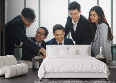 Asian business people team analyzing statistics financial. Team of businesspeople Meeting Conference Discussion Corporate Concept in office. Wall mural