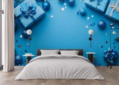 Christmas and New Year holiday blue mockup background. Christmas gifts on blue background top view. Flat lay Wall mural