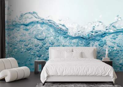 Transparent blue clear water surface texture with ripples, splashes and bubbles. Abstract summer banner background Water waves in sunlight, Cosmetic moisturizer micellar toner emulsion Wall mural