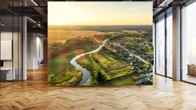 Aerial view. Small european village. Blue winding river. Wall mural