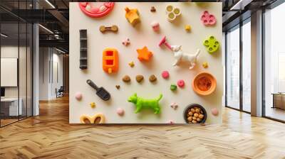 Different shaped pet accessories and food items on a light isolated background Wall mural