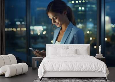 Young successful happy business woman in blue suit, checking her cellphone. Generative AI Wall mural