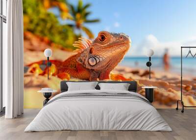 An iguana sunbathing on a sandy beach, perched on a rock, surrounded by tropical nature, showcasing its green, scaly skin and horned appearance in a closeup shot Wall mural