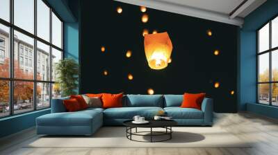 Floating Wishes: A Lantern Ascends Amongst a Sky Full of Lights Wall mural