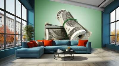 money hundred dollars bill rol colection 3d render on green Wall mural