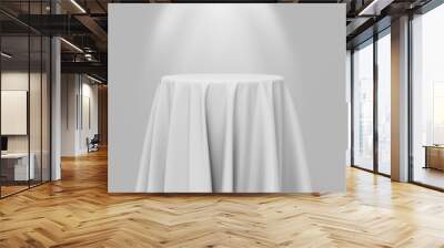 white cloth on a round pedestal on a gray background with illumi Wall mural