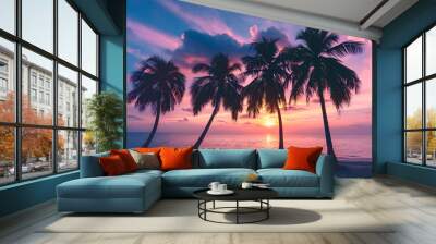 beautiful tropical beach with palm tree silhouettes at dusk Wall mural