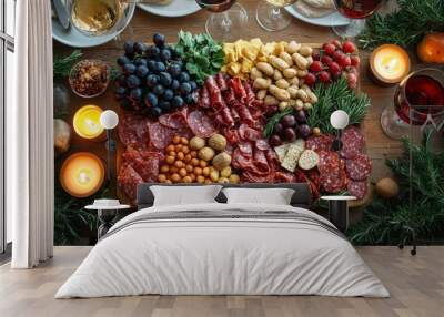 A beautifully arranged charcuterie board with various meats, cheeses, fruits, and nuts, accompanied by wine and candles. Wall mural